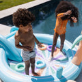 Piscina_de_aventura_muticolor_con_palmera_y_tobogan